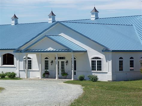 houses with blue metal roofs|blue corrugated roofing.